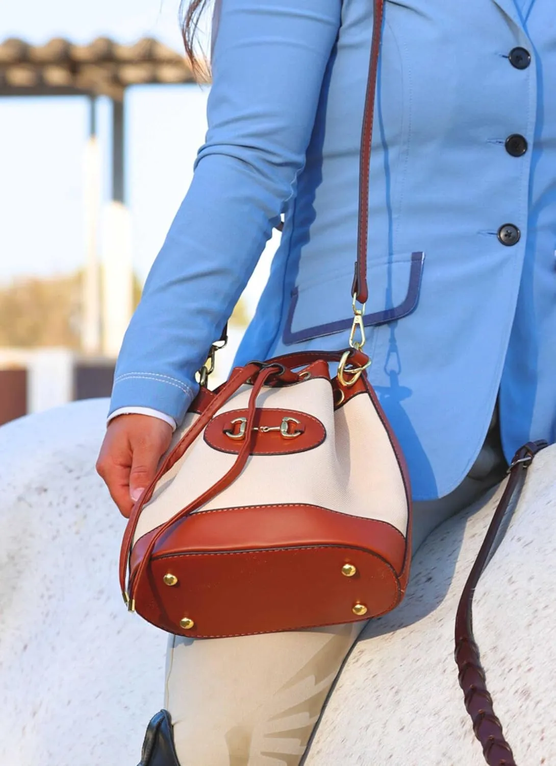 Small Light Brown Equestrian Bucket Crossbody Bag  Classic Vegan Leather & White Canvas Purse with Gold Horsebit Detail, 2 Straps, Preppy Country Club Chic Handbag for Timeless Everyday Elegance